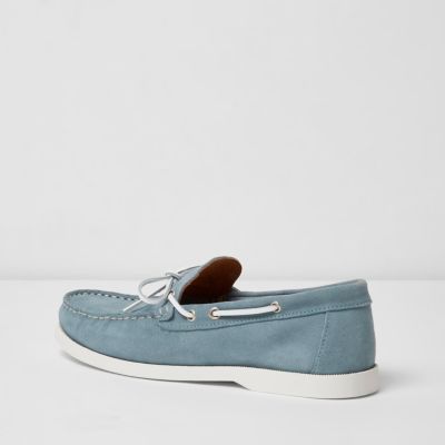 Light blue suede boat shoes